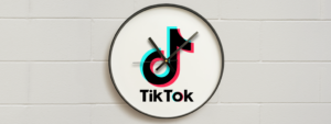 Wall clock displaying the TikTok logo